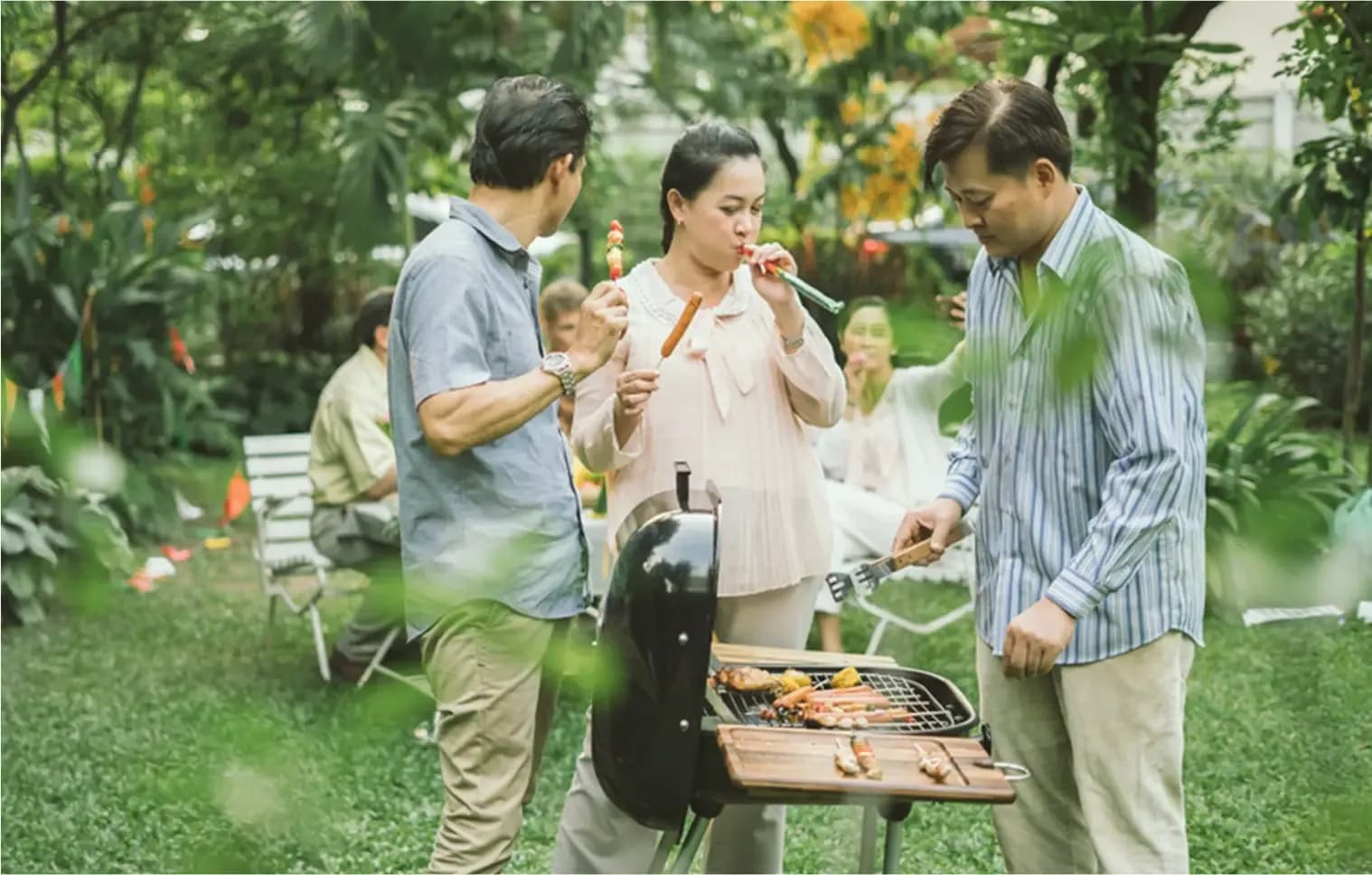 A family having a fun outdoor picnic gathering