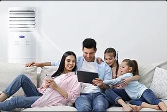 A family bonding together at home with ultimate comfort from floor mounted aircon cooling
